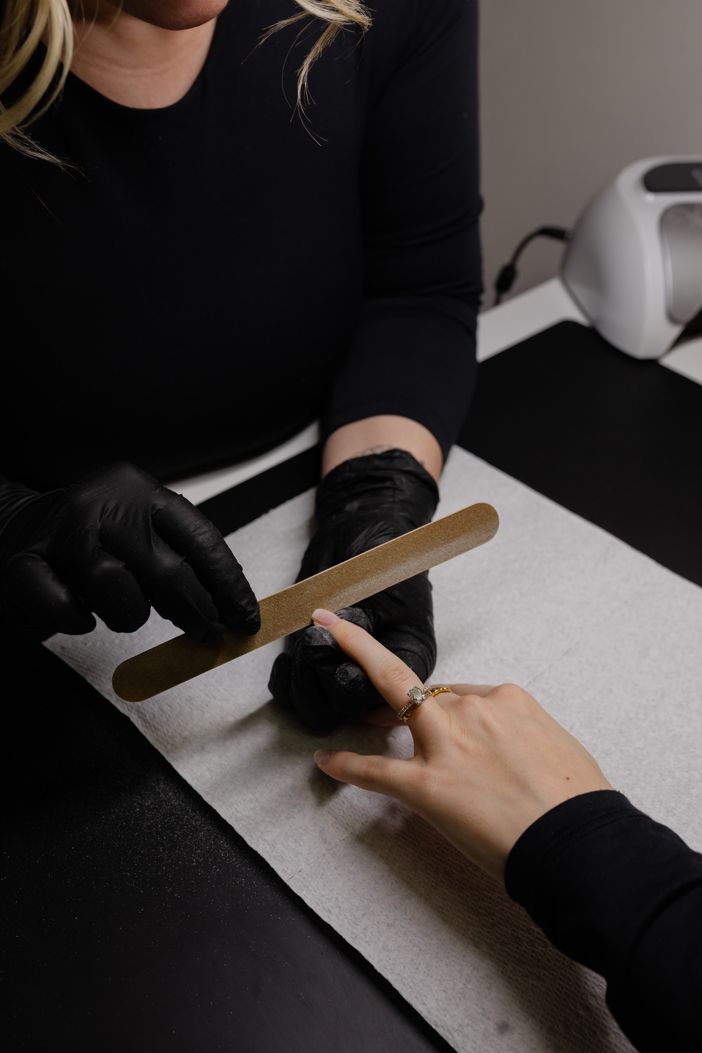 Nail filing and shaping during appointment