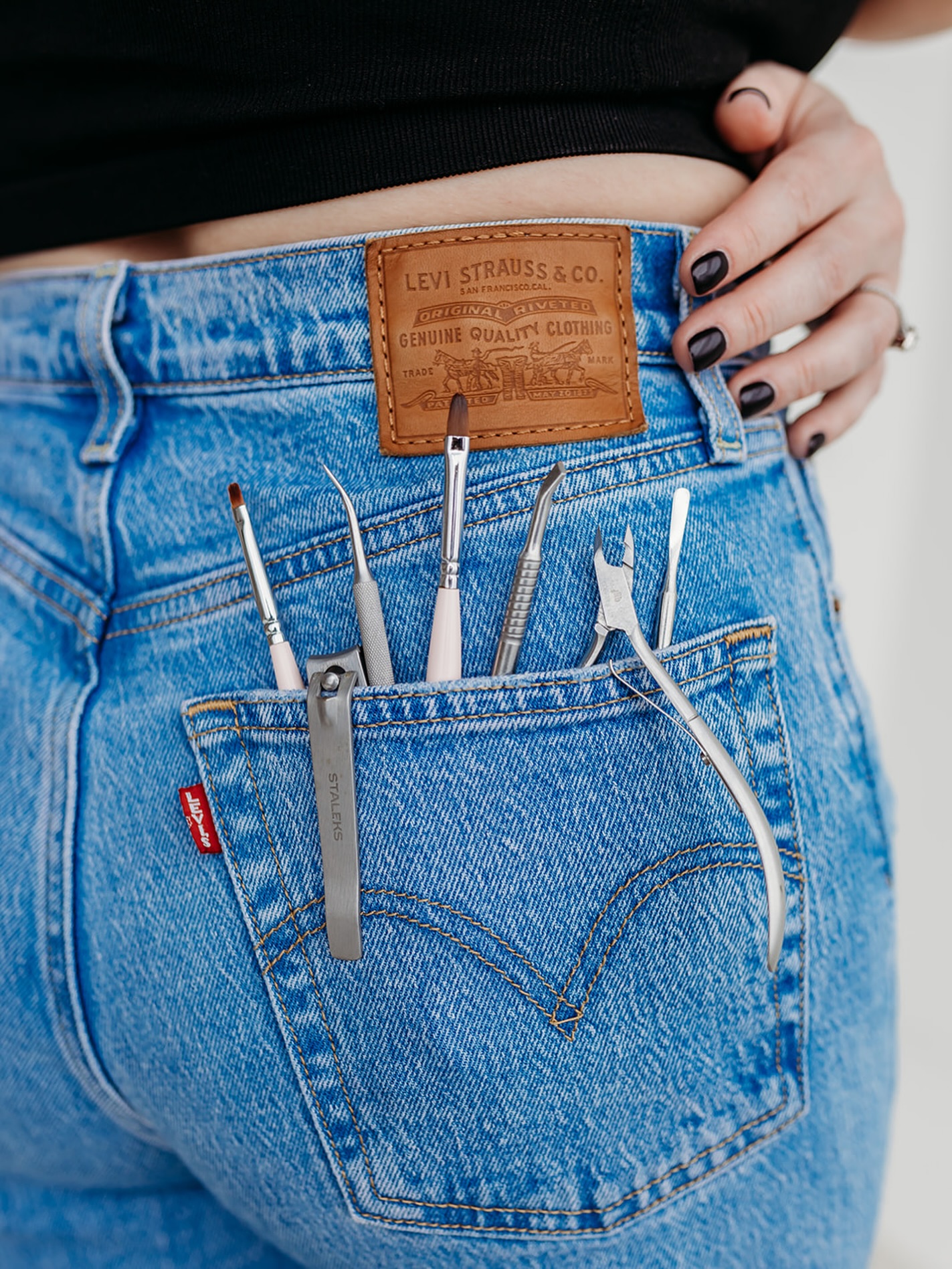 Nail tools in jeans pocket